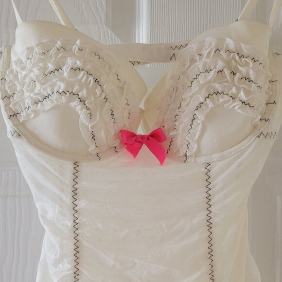 White baby doll with hotpink bow - Picture 1 of 2